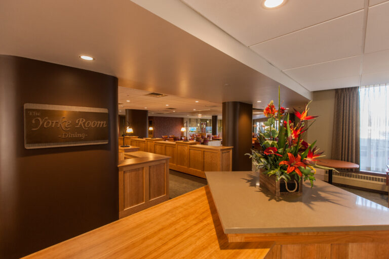 Dark brown painted wall in a senior living facility in Edina Minnesota, painted walls and ceiling in the lunch room of 1500 York.