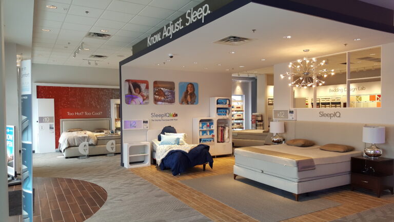 Modern retail mattress showroom Sleep Number Location, finished walls, and branded signage. located in Woodbury Minnesota.